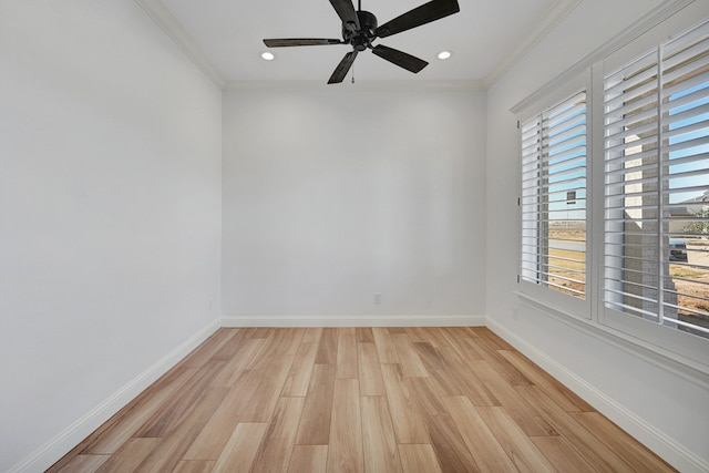 spare room featuring ornamental molding, recessed lighting, light wood-style flooring, and baseboards