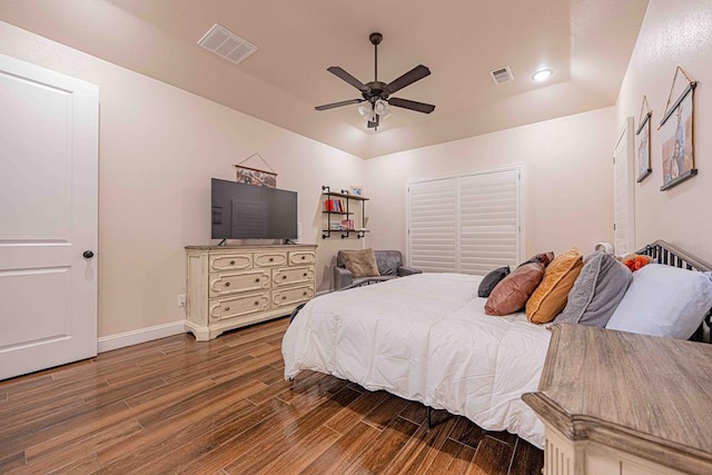1202 Stonefield Dr, Midland, TX 79706 - bedroom featuring wood finished floors, baseboards, a closet, and a ceiling fan