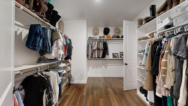1202 Stonefield Dr, Midland, TX 79706 - walk in closet featuring wood finished floors