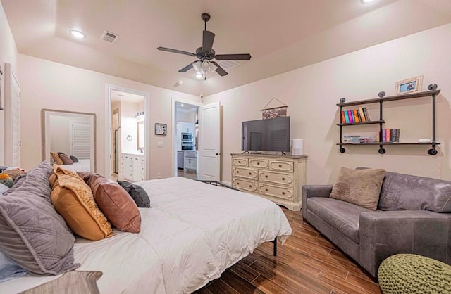 bedroom featuring recessed lighting, wood finished floors, connected bathroom, ceiling fan, and visible vents