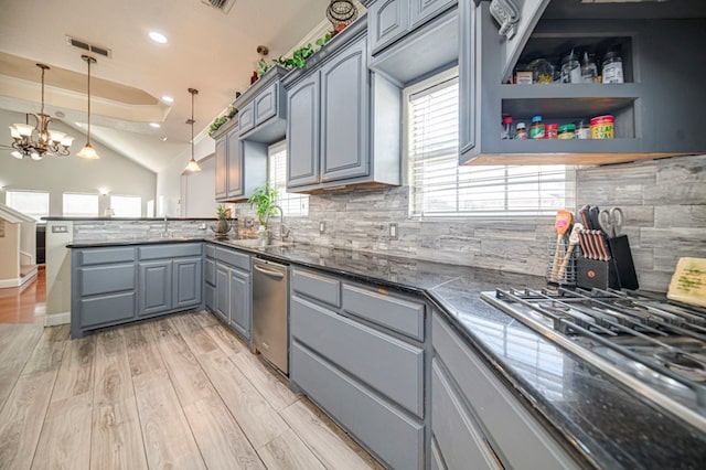 kitchen with gas cooktop, gray cabinets, backsplash, decorative light fixtures, and dishwasher