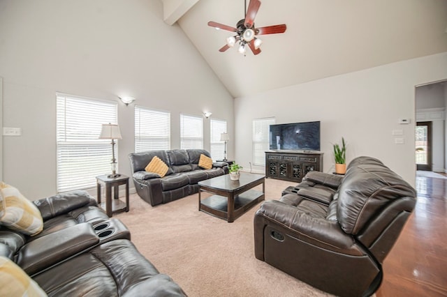 living room with high vaulted ceiling, beamed ceiling, carpet floors, and ceiling fan