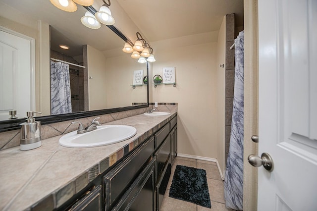 bathroom with vanity and tile patterned flooring