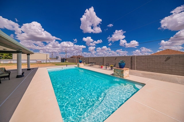 view of pool with a patio area