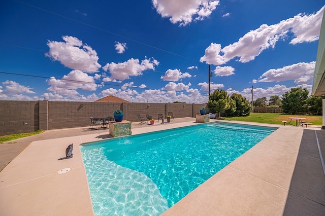 view of pool featuring a patio