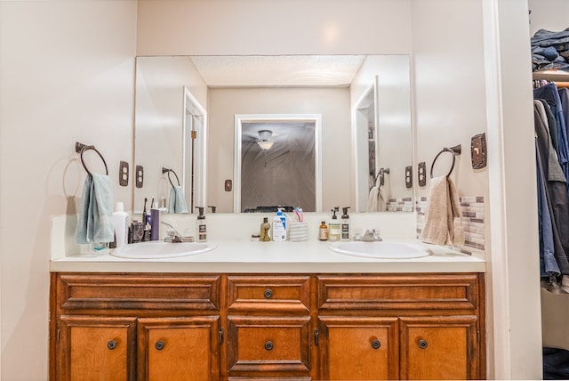 1604 Mcdonald St, Midland, TX 79703 - bathroom with double vanity and a spacious closet