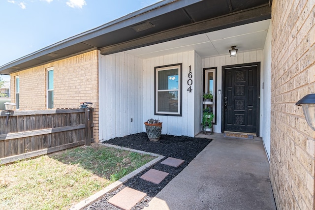 1604 Mcdonald St, Midland, TX 79703 - doorway to property with brick siding