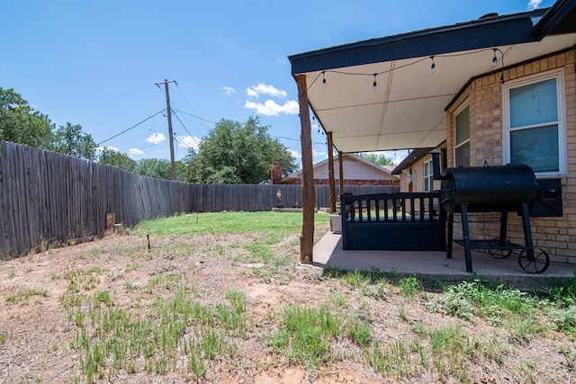 1604 Mcdonald St, Midland, TX 79703 - fenced backyard featuring a patio area