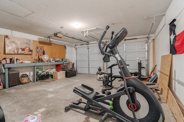 1604 Mcdonald St, Midland, TX 79703 - workout room with a garage and a textured ceiling