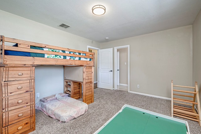bedroom featuring carpet floors, baseboards, and visible vents