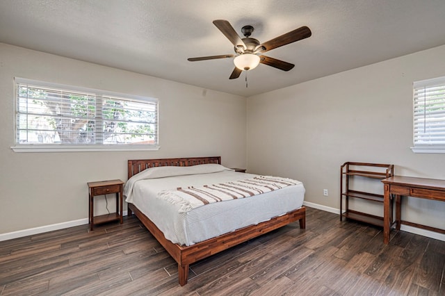 2006 Ward St, Midland, TX 79705 - bedroom with a ceiling fan, baseboards, wood finished floors, and a textured ceiling