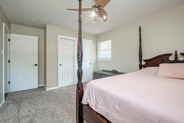 carpeted bedroom with baseboards, ceiling fan, and a closet