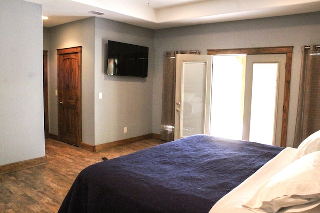 bedroom featuring hardwood / wood-style floors