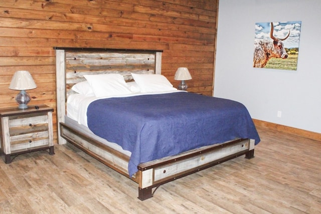 bedroom featuring hardwood / wood-style flooring