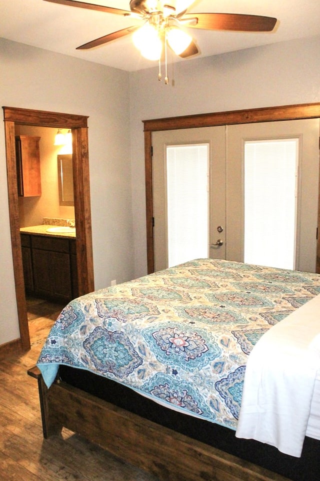 bedroom featuring french doors, ceiling fan, sink, connected bathroom, and light hardwood / wood-style floors