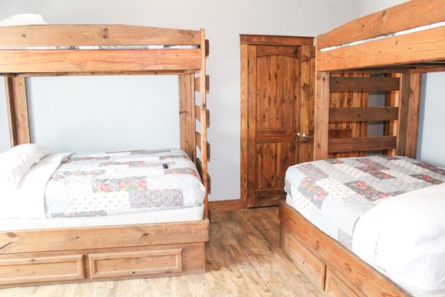 bedroom featuring hardwood / wood-style flooring