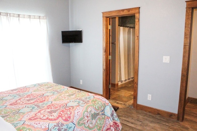 bedroom featuring hardwood / wood-style flooring