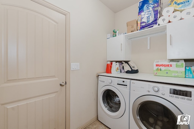 clothes washing area with separate washer and dryer