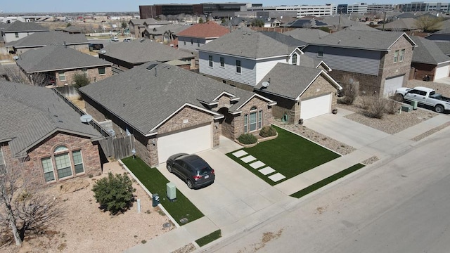 drone / aerial view featuring a residential view