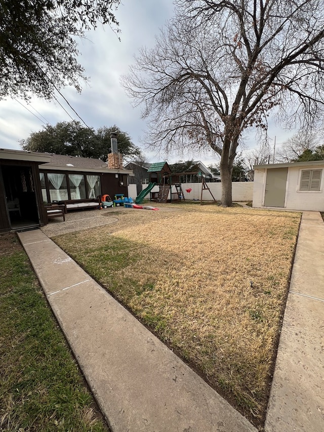 view of yard featuring a playground