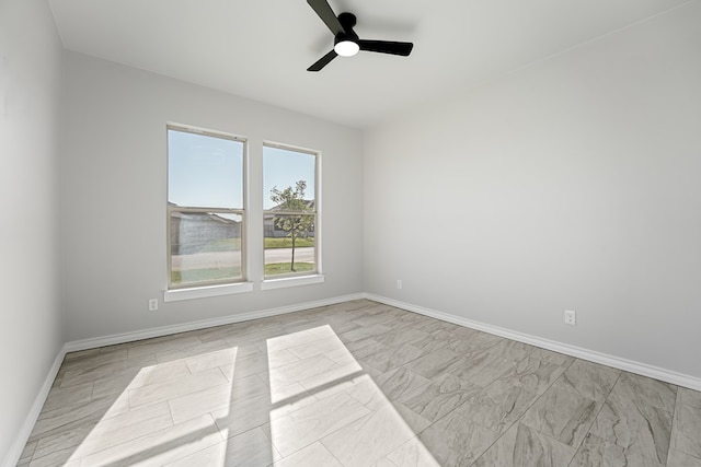 spare room featuring ceiling fan