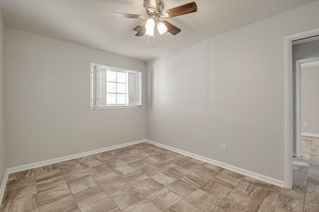 empty room featuring ceiling fan