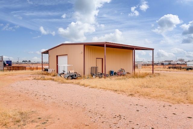 view of outdoor structure featuring a garage