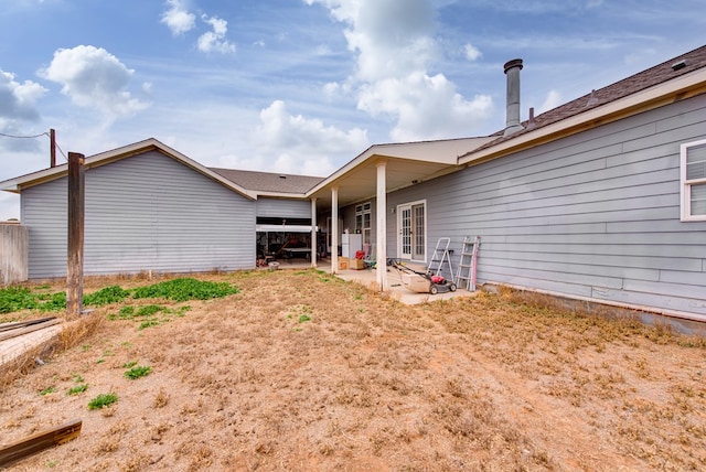 rear view of house with a patio area