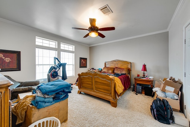 bedroom featuring ceiling fan, ornamental molding, and carpet flooring