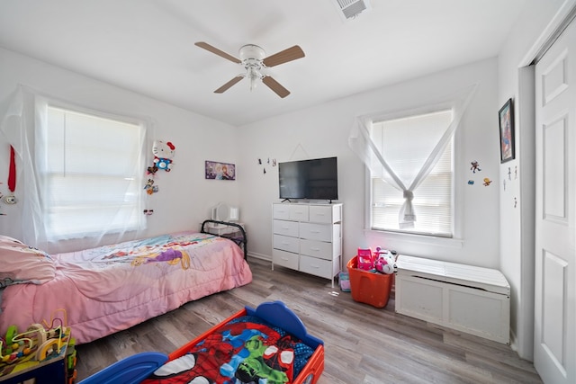 1213 Ridgeroad Dr, Big Spring, TX 79720 - bedroom featuring wood finished floors and a ceiling fan