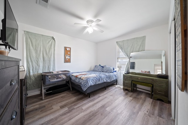 1213 Ridgeroad Dr, Big Spring, TX 79720 - bedroom with wood finished floors and a ceiling fan
