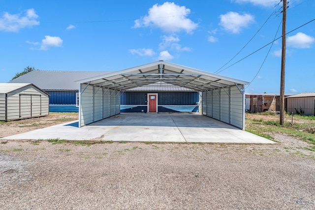 garage featuring a carport