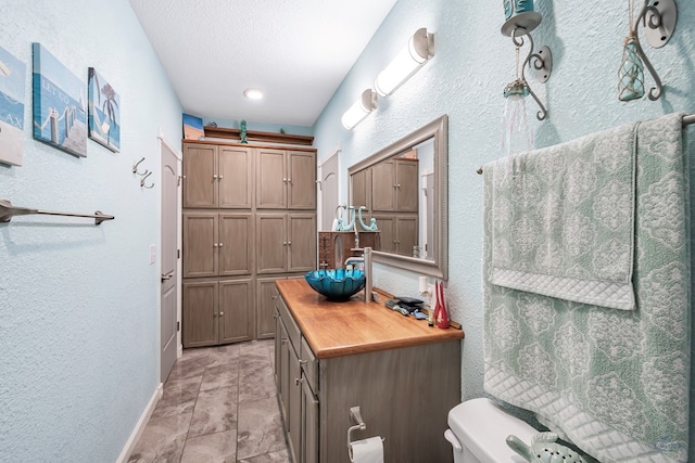 bathroom with toilet and sink