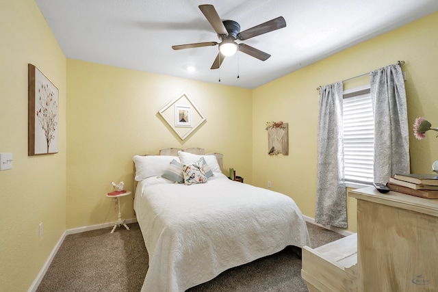 bedroom with ceiling fan and carpet floors