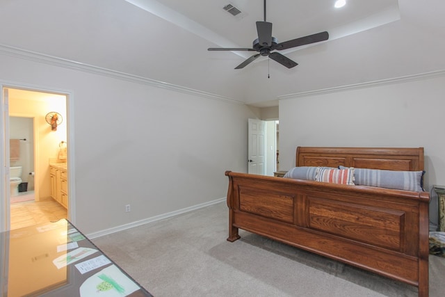 bedroom featuring crown molding, connected bathroom, light carpet, and ceiling fan