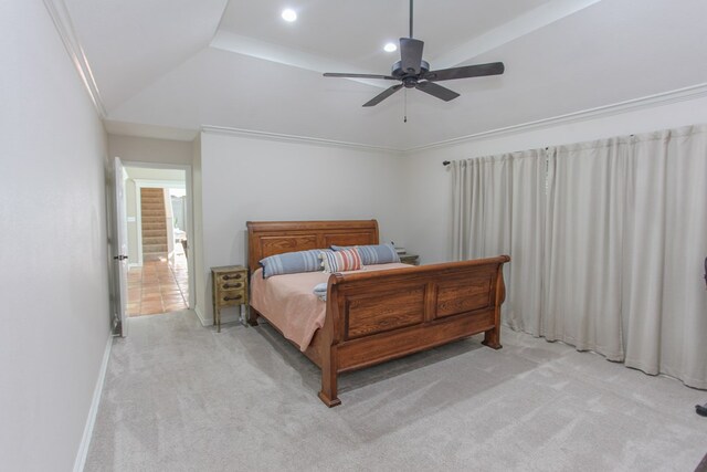 carpeted bedroom with crown molding, ceiling fan, and lofted ceiling