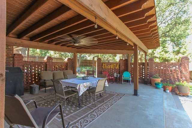 view of patio / terrace featuring ceiling fan