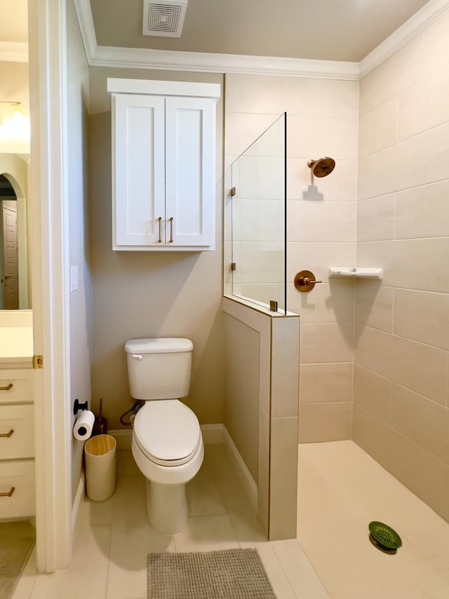 full bath featuring visible vents, toilet, ornamental molding, tile patterned flooring, and a walk in shower