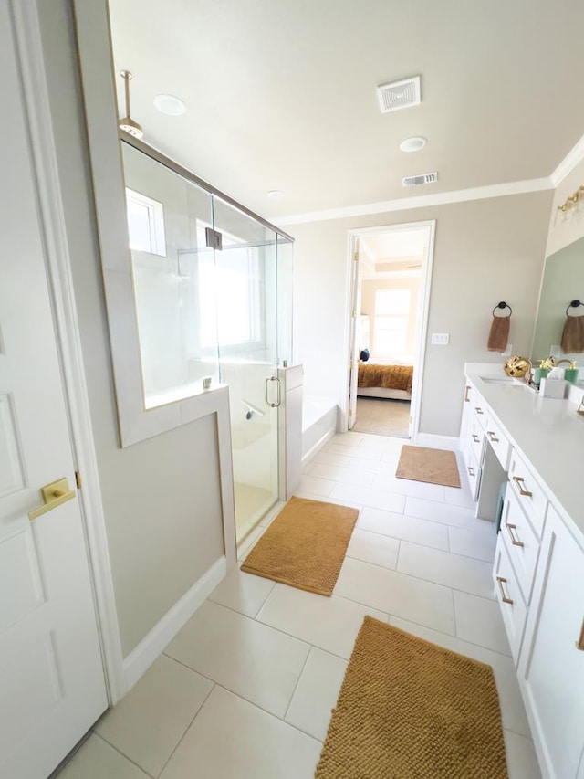 full bath with visible vents, ornamental molding, a stall shower, vanity, and tile patterned flooring