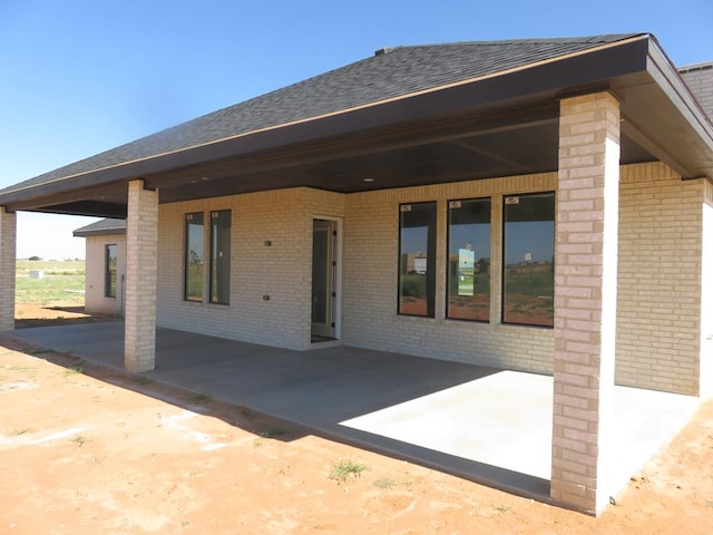 rear view of house with a patio area