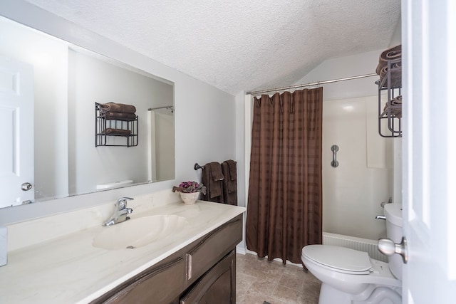 bathroom featuring toilet, vaulted ceiling, vanity, and a textured ceiling