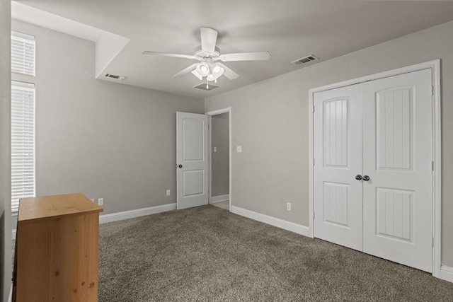403 Mile High Ln, Midland, TX 79706 - unfurnished bedroom featuring carpet floors, a closet, baseboards, and a ceiling fan