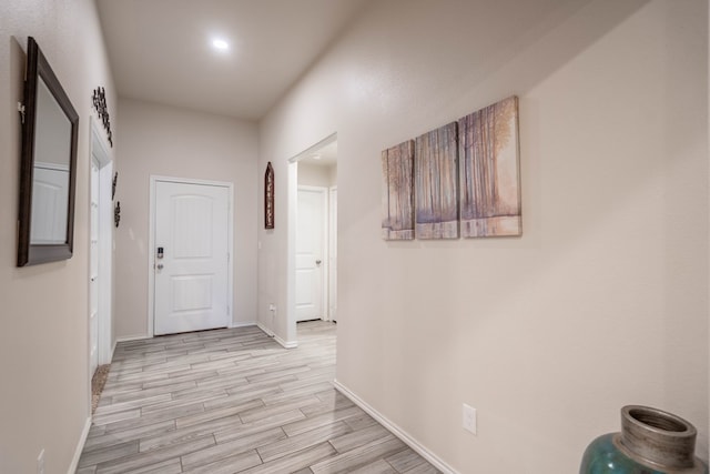 807 Bronco Ct, Midland, TX 79705 - hallway featuring baseboards and light wood-type flooring