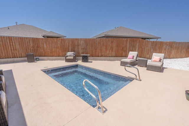 807 Bronco Ct, Midland, TX 79705 - view of swimming pool featuring a patio area and a fenced backyard