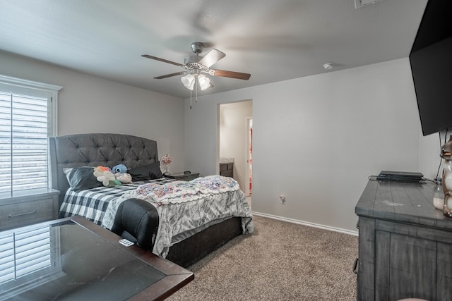 807 Bronco Ct, Midland, TX 79705 - bedroom featuring carpet flooring, a ceiling fan, and ensuite bath