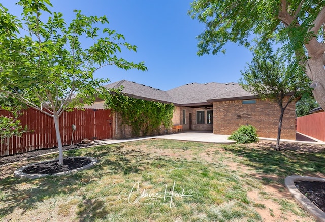5305 Wimberley Spring Ct, Midland, TX 79707 - back of property featuring a patio and brick siding