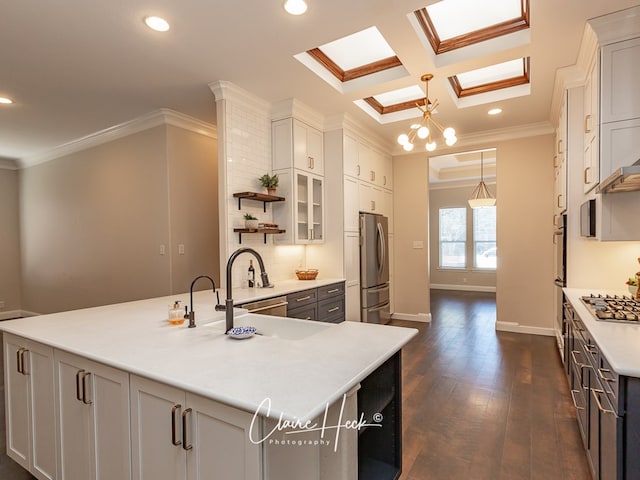 kitchen with stainless steel appliances, recessed lighting, ornamental molding, and open shelves