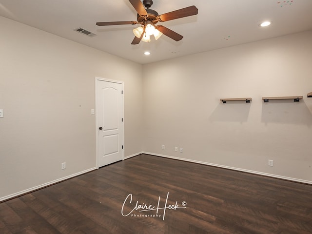 empty room with baseboards, visible vents, dark wood finished floors, a ceiling fan, and recessed lighting