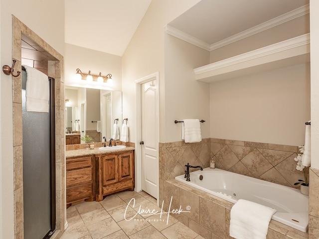 5305 Wimberley Spring Ct, Midland, TX 79707 - bathroom with a bath, vanity, ornamental molding, tile patterned floors, and a shower with shower door