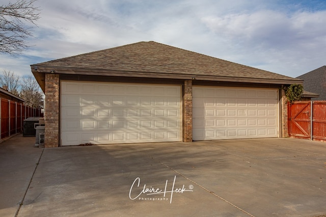 detached garage with fence